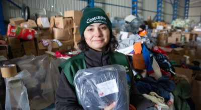 Ozge Celebi of Concern Worldwide Türkiye says the team organising distribution of donated goods have been finding messages of goodwill for the recipients of Adiyaman city centre who were badly hit by the earthquake of February 6th, 2023. As many as half of the buildings were destroyed or rendered uninhabitable. (Photo: Kieran McConville/Concern Worldwide)