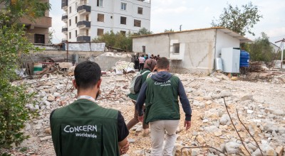 Concern staff inspect the demolition and removal of unsafe buildings in a community In Hatay. (Photo: Gavin Douglas/Concern Worldwide)