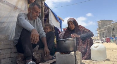 Hassan* (48) and Mariam* (34) are married with five children and living in a refugee tent in Rafah, struggling with hunger and relying on canned food or informal donations. (Photo: Concern Worldwide)