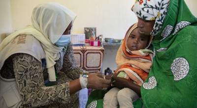 Mona Salh with her son, Faiza Abdullah (3) at Um Shalaya health centre in Central Darfur, Sudan. 