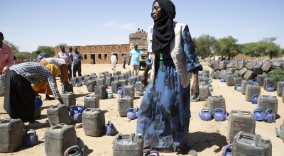 A distribution of hygiene kits at Banjdeed, West Darfur, Sudan, targetting vulnerable households in 10 of the surrounding villages. This area was badly affected by the conflict that broke out in Sudan in April 2023 and many people fled across the border to Chad, leaving everything behind. Some of them have since returned to find their homes damaged or destroyed and their possessions looted. 