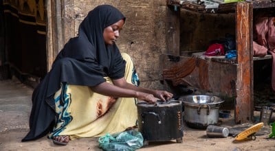 Idil* a mother of seven children, sells clothes and shoes in Wadajir district. Through a self-help group, she was able to enrol in various training programmes for business and household management, including improving how to solve household issues as a couple. The business training taught her how to read and write, as well as how to do maths and calculate her earnings. Photo: Mustafa Saeed/Concern Worldwide
