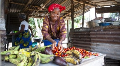 Favor B Tarr, with some of the produce from her vegetable farm at Kaytor Town, Grand Bassa, Liberia. The community is being supported by Concern in an integrated programme called IFANCI, funded by the LDSCC. (Photo: Kieran McConville/Concern Worldwide)