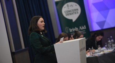 Ellie McCabe from Sandford Park School, Ranelagh in Dublin takes to the podium at the Concern All Debate semi-finals