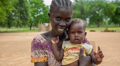 Adut with her daughter Axlam (nine months) at the Lueth Ngor PHCU (Public Health Care Unit) in Aweil North. Photo: Eugene Ikua/Concern Worldwide