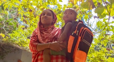 Hosenare Aktar (28) is a mother of 2. She has two sons Sakib (10) and Rakib (2) pictured. Before CRAAIN, Hosenare had never farmed before. Concern gave her training, seeds and goats. Now she has ducks, goats and an abundance of vegetables all because of Concern. She also employs a lot of climate smart agriculture like growing in bags and making compost and growing on elevated terraces. Photo: Gavin Douglas/ Concern Worldwide