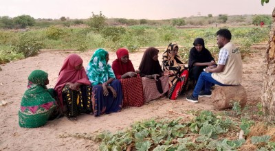 Concern team with a women's permagarden group discussing the impact of Hanaano project and expected results. Photo: Abdinasir Hassan/ Lifeline Gedo.