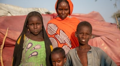 Lana with three of her eight children. From Left: Umi (9), Abdul (5) and Mohammed (7) at their shelter in Lac Province in Western Chad. Photo: Eugene Ikua/Concern Worldwide