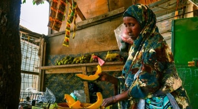 Surad* (55) runs her own shop in Bondhere district in Mogadishu. Concern’s Self-Help Group (SHG) model gave Surad* the support and skills she needed to begin her own business. The SHG programme first helps women individually, teaching them essential skills like business development. Photo: Adnan Mohamed/Concern Worldwide