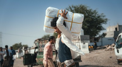 The Concern team distributing shelter materials to people affected by the sandstorm that struck Al Anad IDP Camp, Tuban District, Yemen. 