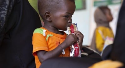 Jamal eats therapeutic food at a nutrition clinic, supported by Concern Worldwide, in Ardamata, just outside El Geneina, Sudan. Jamal* is severely acutely malnourished.