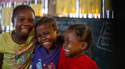 Students Pleasant, Handful and Pennita attend an accelerated learning centre