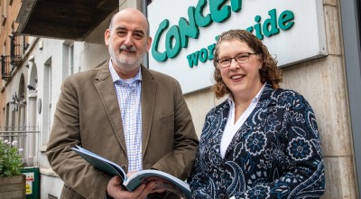 Concern Worldwide Chief Executive Officer Dominic Crowley and Chair Rosalyn Tamming with the 2025 Annual Report. Photo: Jon Hozier-Byrne/Concern Worldwide