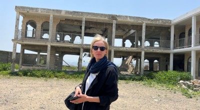 Journalist Orla Guerin standing outside an abandoned building in Taiz, Yemen
