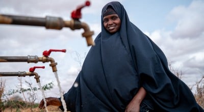 Local farmer Luul Ahmed collecting water at Bula Qalooc, Dolow District, Gedo region, southwestern Somalia