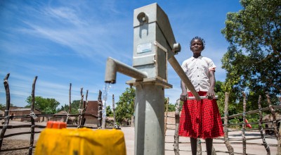 15 year old Liliana Mwenza wa llunga says the new water point and other interventions by the Concern-led WASH consortium in her village, Mulombwa, has had a very positive impact on family life. Photo: Kieran McConville/ Concern Worldwide.