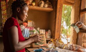 Eliza Manjolo, a beneficiary of Concern's 'Umodzi' Graduation programme in her shop in Nsanje, Malawi, April 2021. Photo: Chris Gagnon / Concern Worldwide.