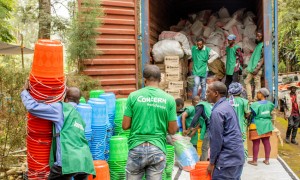 Concern staff members organise the distribution of household and hygiene kits as part of the SAFER programme, funded by FCDO. Photo: Samuel Isenge/Concern Worldwide