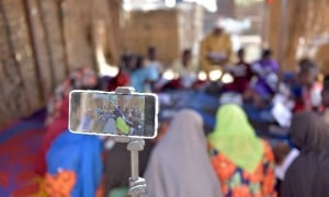 Video coaching for a listening club. Photo: Concern Worldwide.
