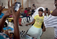 Djenise Hilaive takes part in a hair and make-up training session