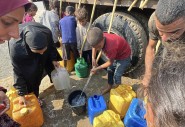 CESVI supported by Concern distribute water to Al- Zawaida in Gaza