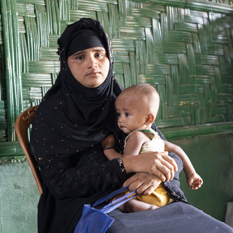 Ayesha, a Rohingya mother, with her son Anwar