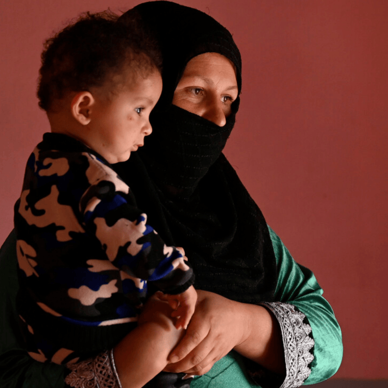 Malalai* holding her son Yaser